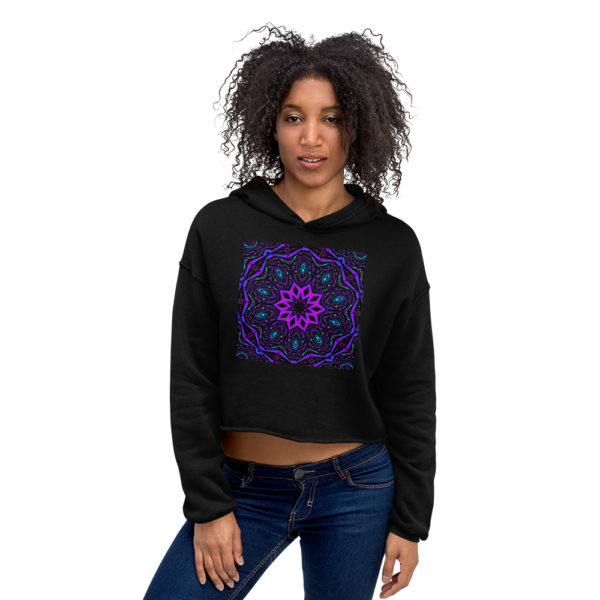 woman wearing purple artistic kaleidoscope design on a black crop top sweatshirt