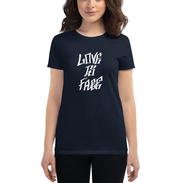 women wearing navy t-shirt that says love is free in graffiti letters