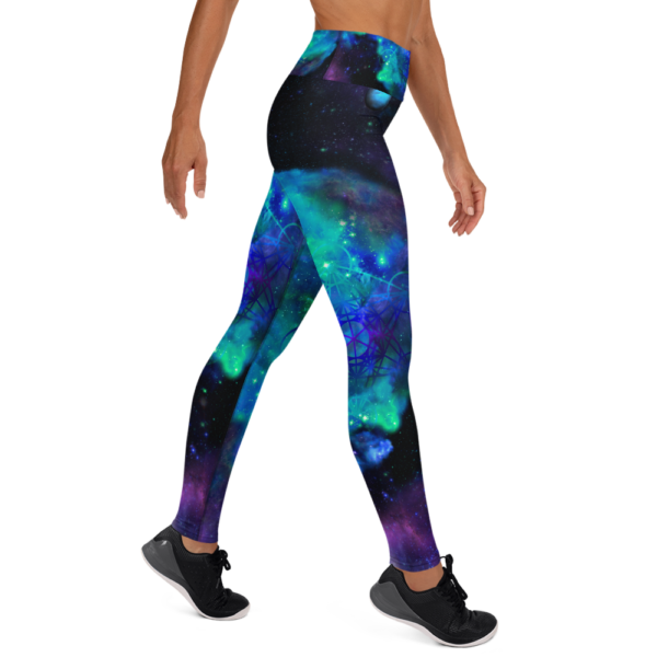 woman wearing yoga leggings with cool colored nebulae and metatron's cube