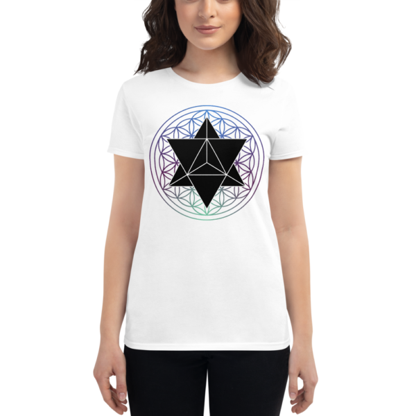woman wearing t-shirt with a black merkaba and a colored flower of life
