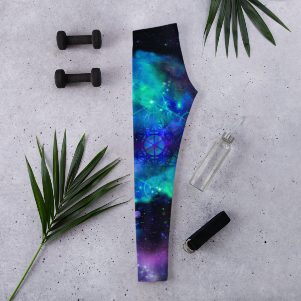 lifestyle image of leggings with cool colored nebulae and metatron's cube