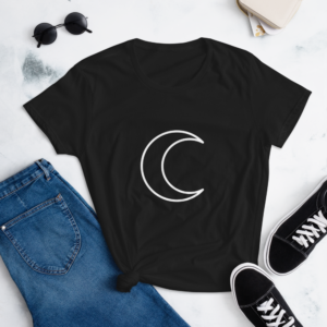 lifestyle image of a t-shirt with white crescent moon symbol
